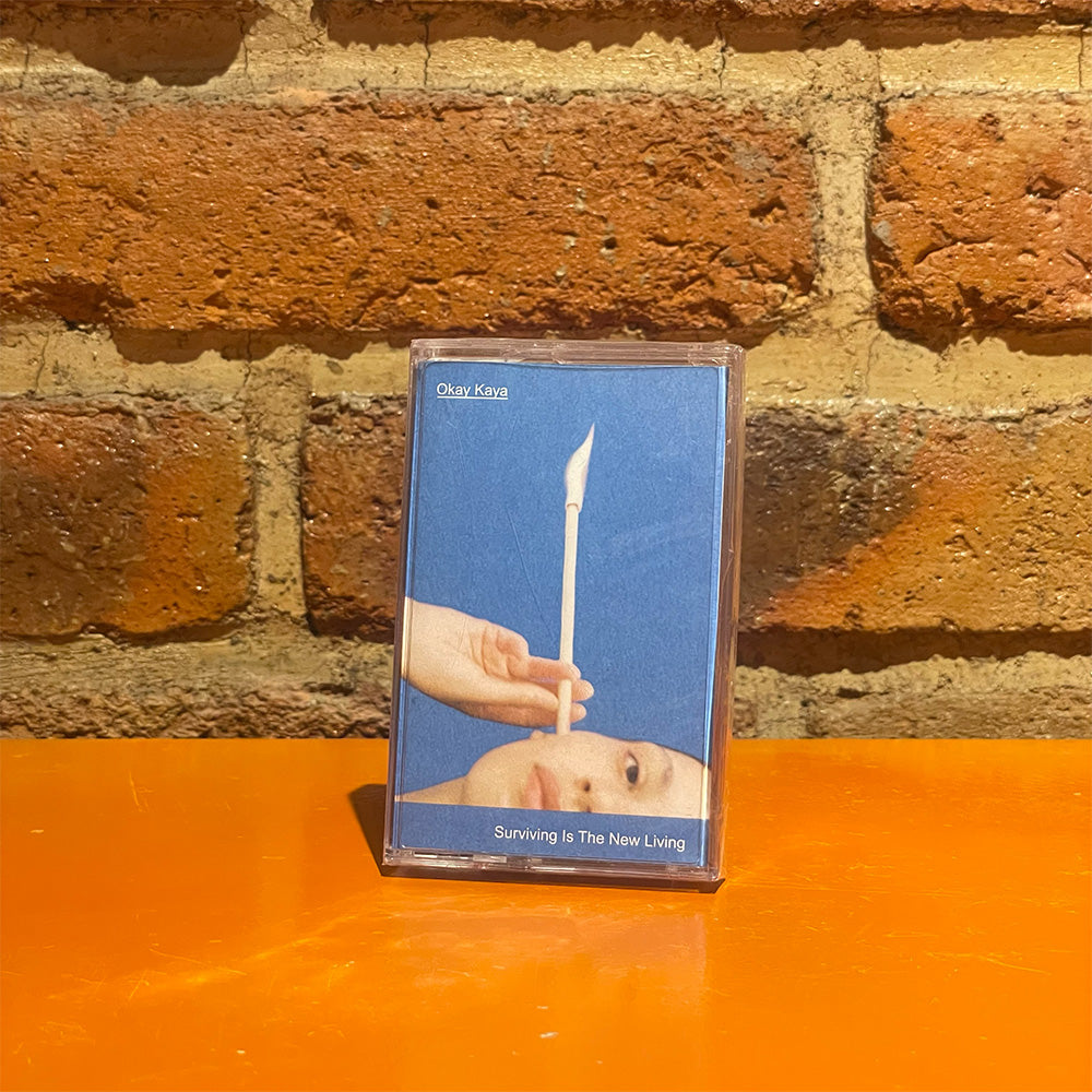 OKAY KAYA - SURVIVING IS THE NEW LIVING (CASSETTE)