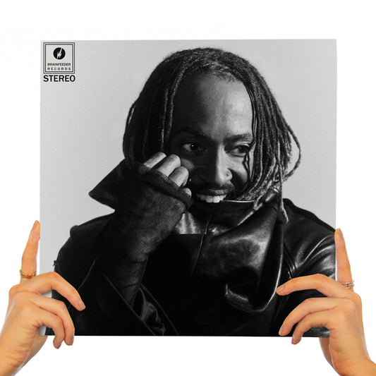 THUNDERCAT - DISTRACTED (BLACK MARBLED SMOKE VINYL)
